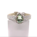 White iridescent glitter pet collar with peridot green teardrop crystal centerpiece and rhinestone halo setting for cats and dogs