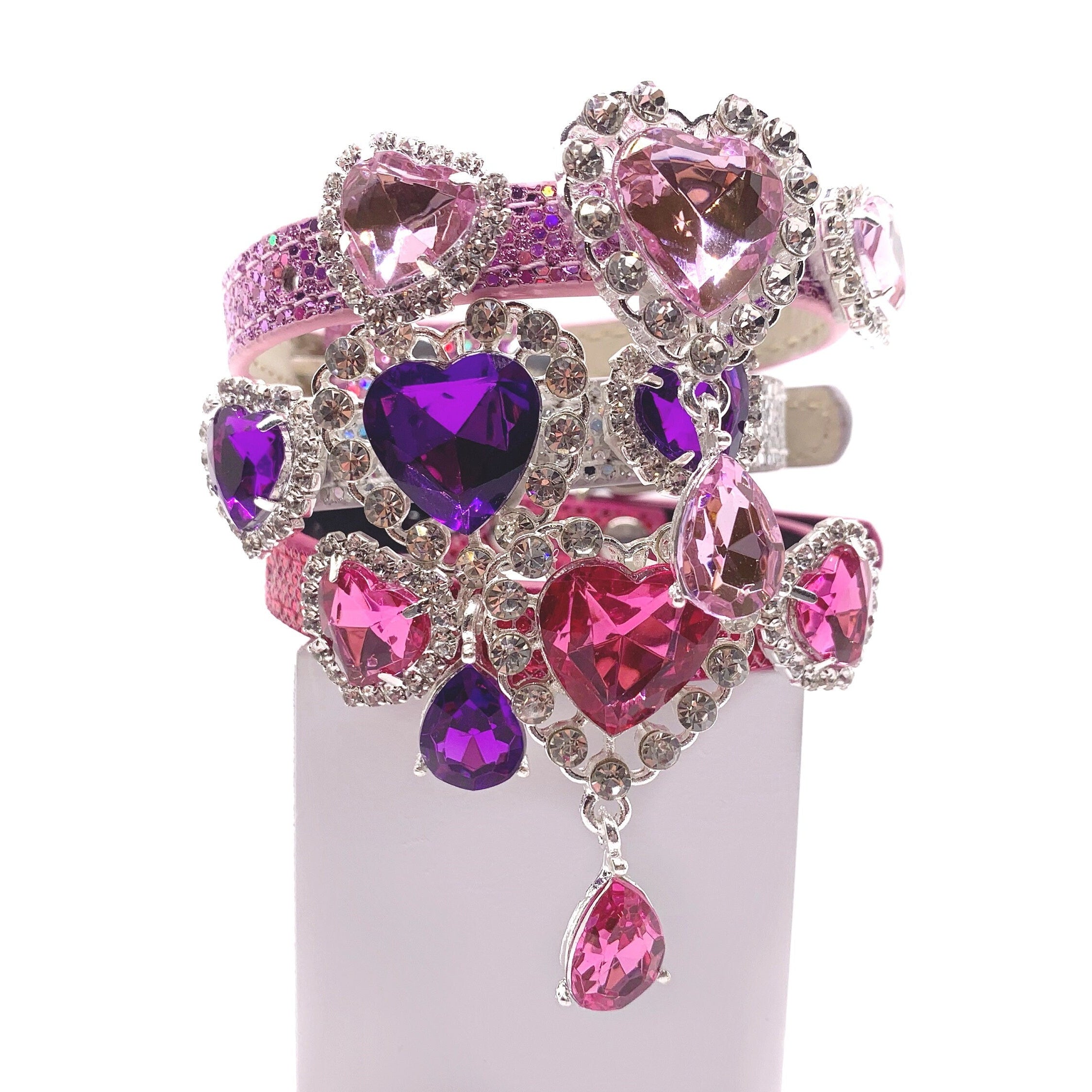 Luxury pink glitter pet collar with cascading purple and pink heart rhinestone chandelier pendant, crystal halo settings, and teardrop charm for cats and dogs