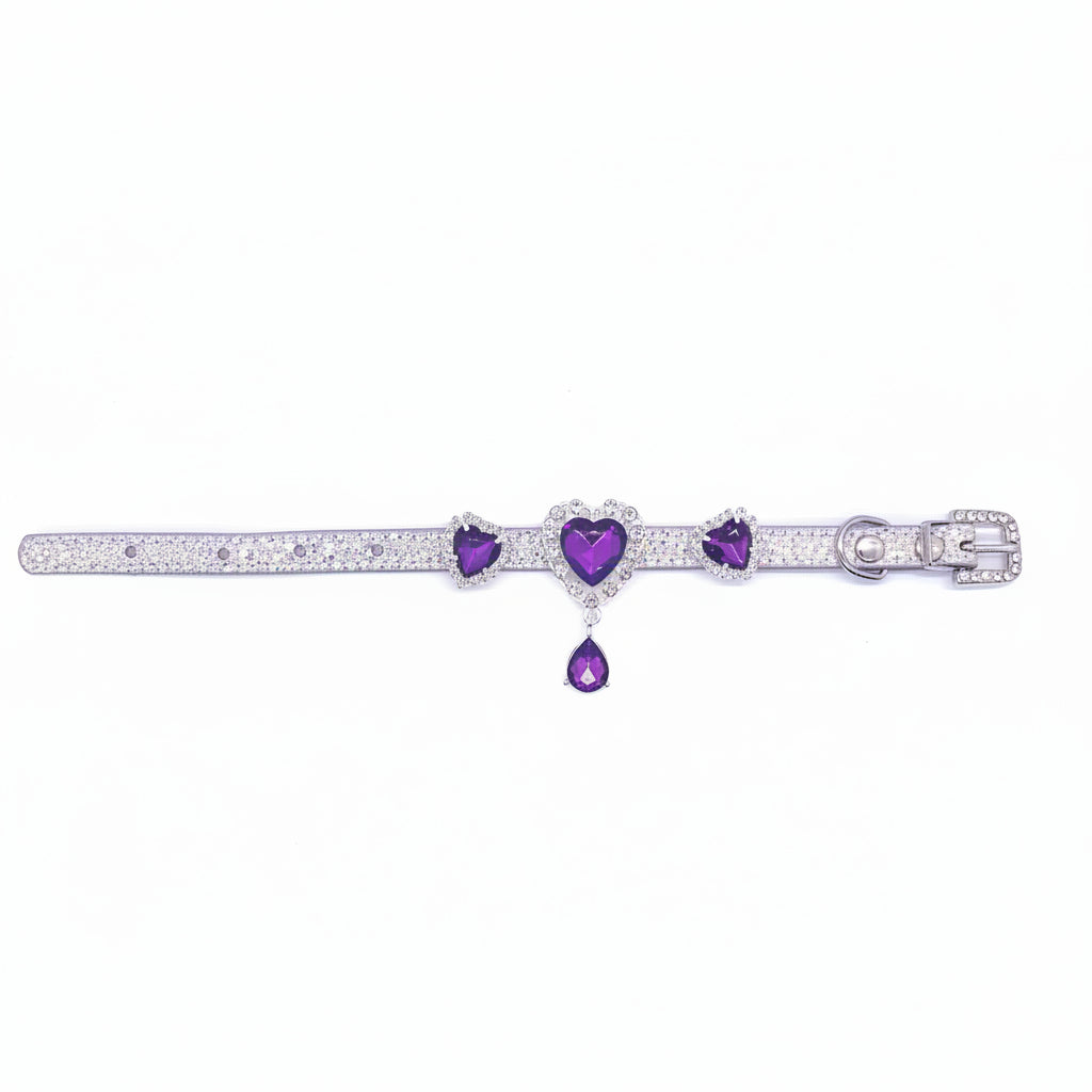 Luxury silver glitter pet collar with triple amethyst purple heart rhinestone centerpiece, crystal halo settings, and teardrop pendant charm for cats and dogs on white background