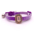 Purple velvet pet collar with champagne emerald-cut rhinestone charm and silver bell