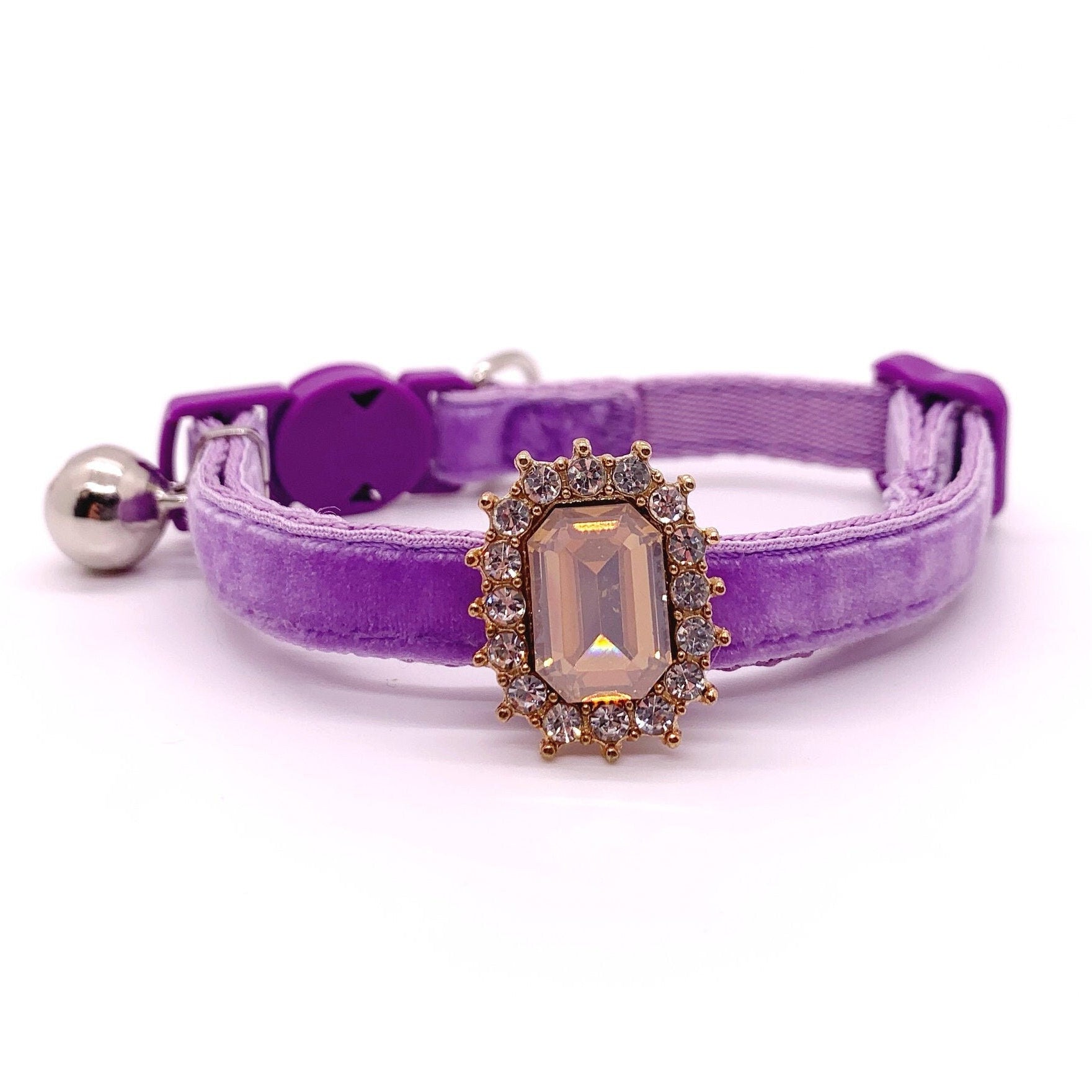 Purple velvet pet collar with champagne emerald-cut rhinestone charm and silver bell