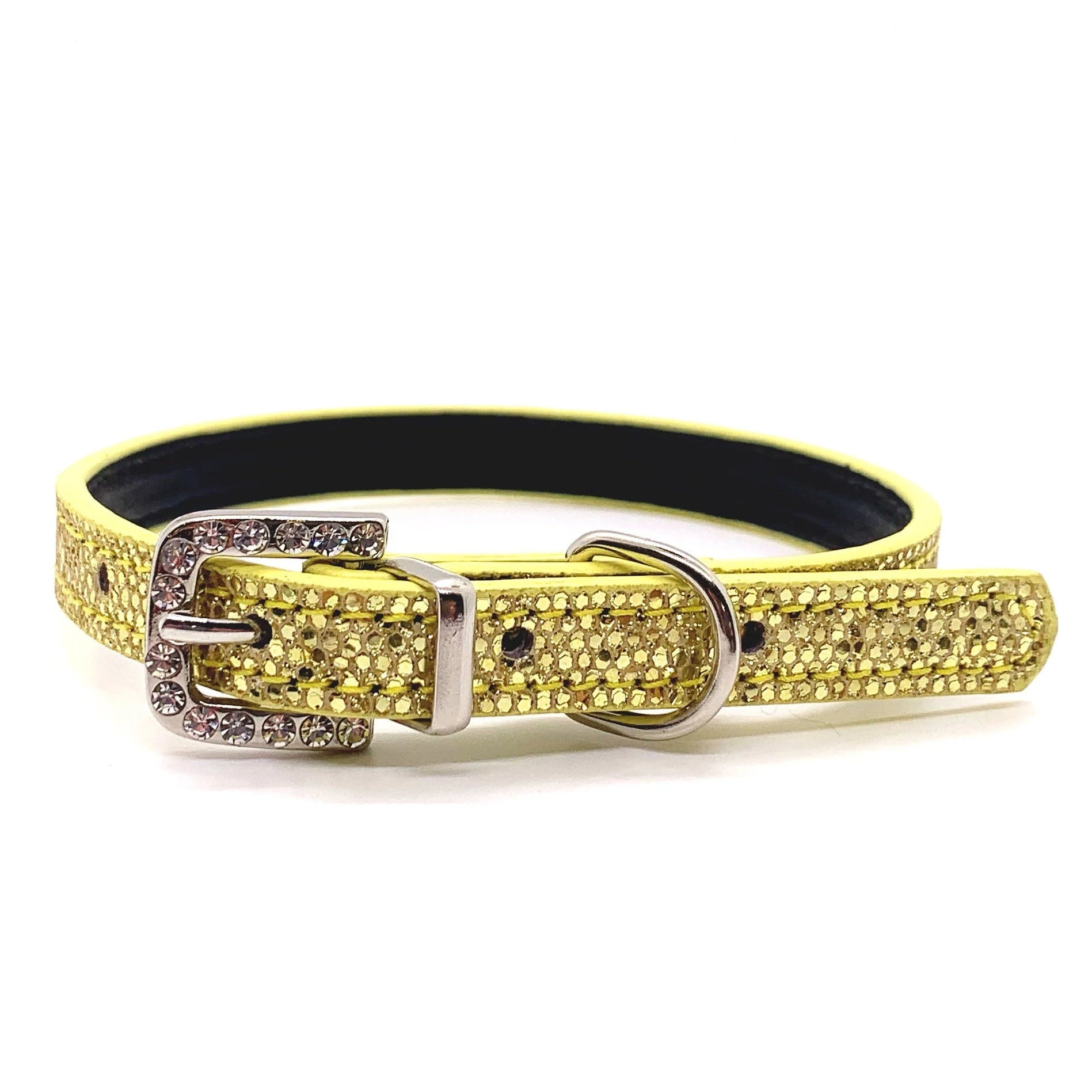 Yellow dog collar with rhinestone detailing on a white background