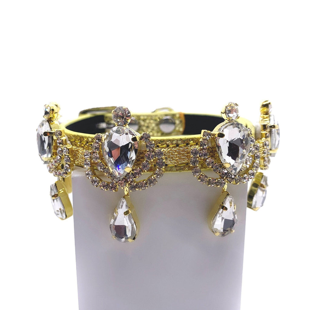 Gold leather luxury dog collar with gold chandelier rhinestone band, large faceted clear crystal teardrop centerpieces, swag rhinestone drape, and dangling crystal teardrop pendants