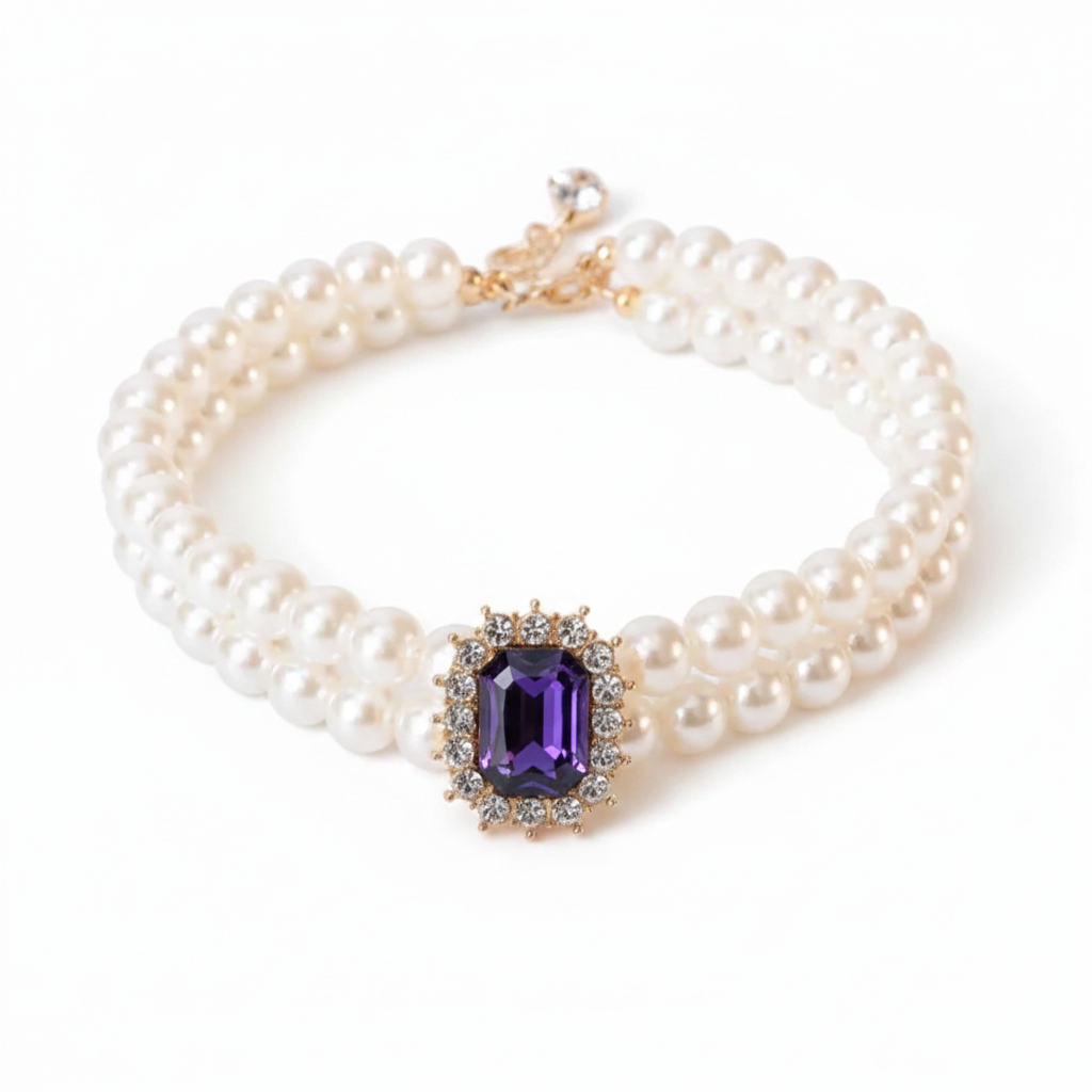 Double-strand pearl pet collar with deep indigo tanzanite emerald-cut crystal centerpiece and gold hardware