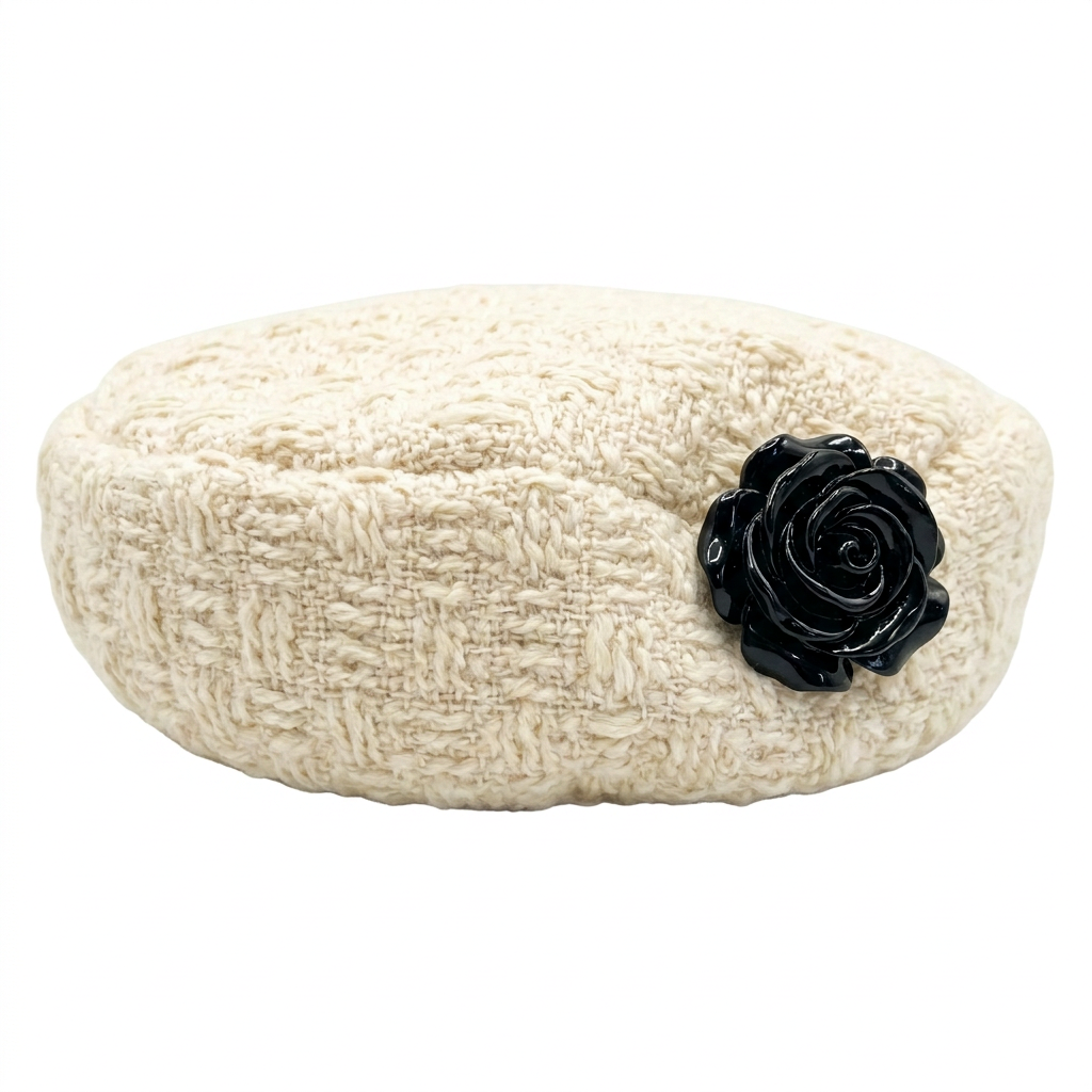 Ivory beret with black rose on a pure white background