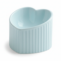 Light blue ceramic heart-shaped pet bowl with ribbed exterior, white background
