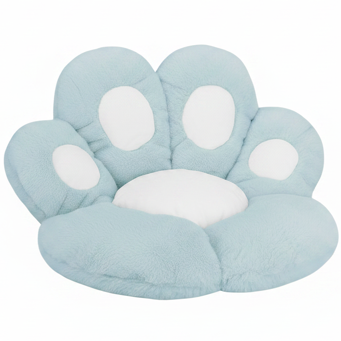Powder blue plush paw-shaped pet bed cushion with white toe pad accents, shown at a slight angle on a white background