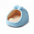 Light blue white polka dot igloo cat cave bed with matching bow detail and cream fleece interior, white background