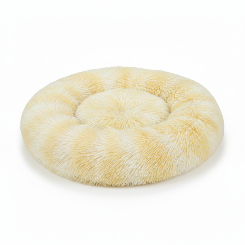 Round light yellow tie-dye shaggy faux fur donut calming pet bed top-down view on white background