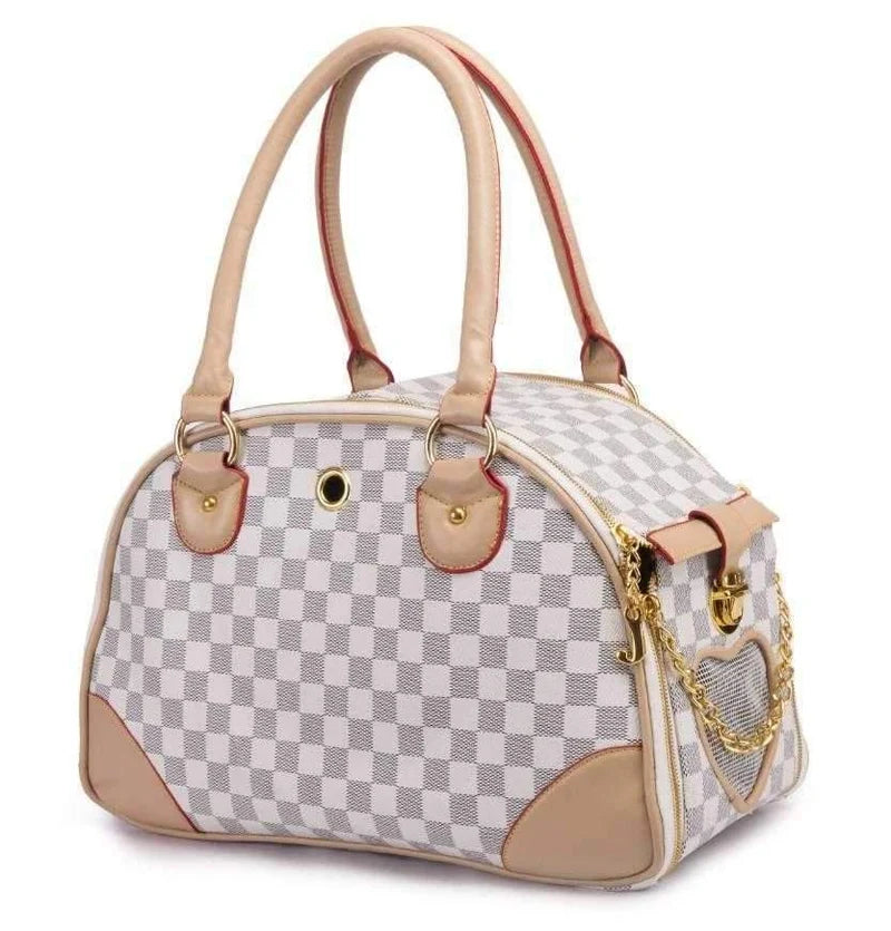 Checkered pet carrier with beige accents on a white background