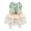 Mint sequin and ivory tiered pet dress with green jeweled bow on a square white background