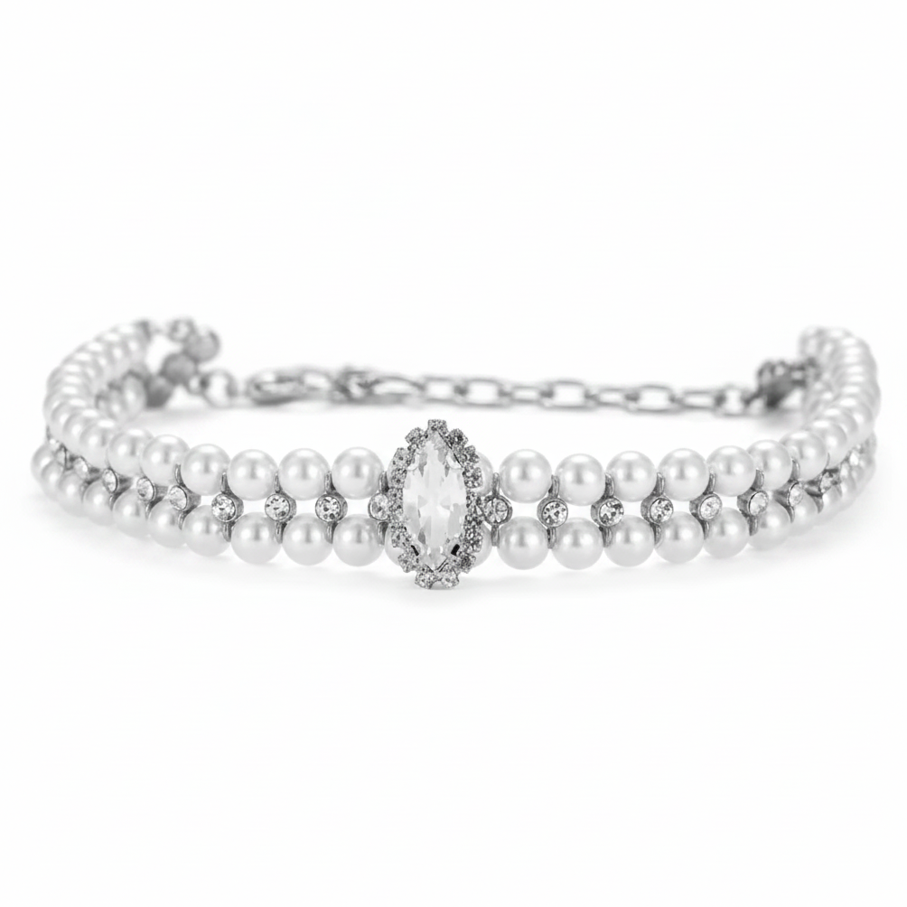 Double-strand white pearl pet collar with silver hardware, small crystal accents between the pearls, and a marquise-cut clear crystal centerpiece surrounded by a halo of small crystals, on a white background