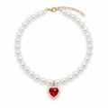 Pearl collar with ruby-red heart gemstone