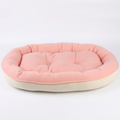 Pink pet bed cleanup on white background