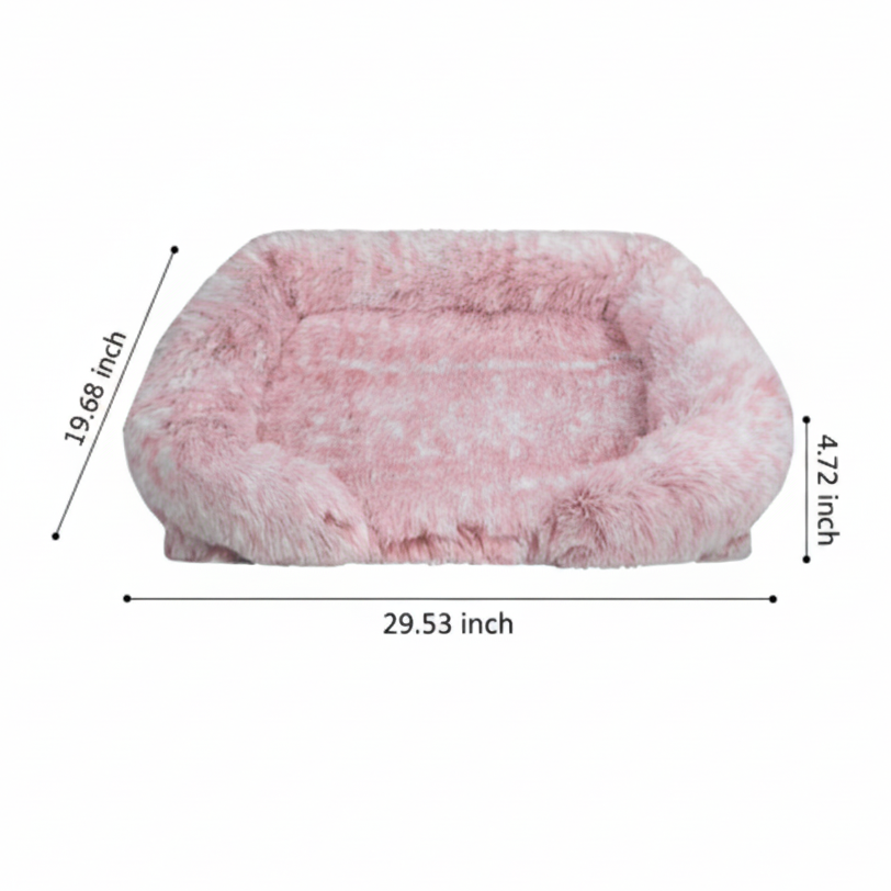 Blush pink long shaggy faux fur rectangular pet sofa bed shown at a 3/4 angle on a white background with dimension annotations: 29.53 inches long, 19.68 inches wide, and 4.72 inches tall