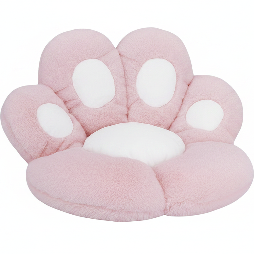 Blush pink and white plush paw-shaped pet bed cushion with white toe pad accents, shown at a slight angle on a white background