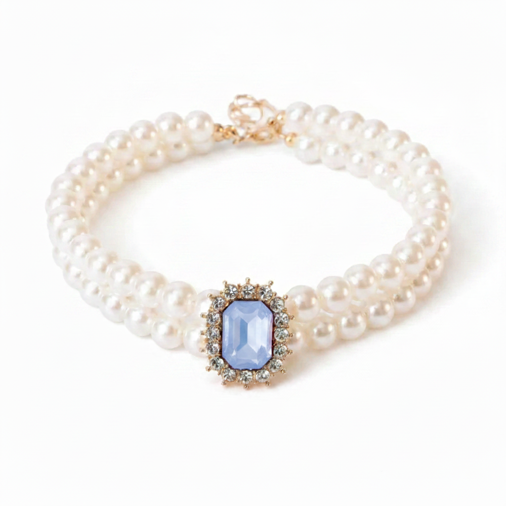 Double-strand pearl pet collar with powder blue emerald-cut crystal centerpiece and gold hardware