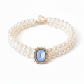 Double-strand pearl pet collar with powder blue emerald-cut crystal centerpiece and gold hardware