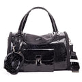 Black crocodile-patterned pet carrier with matching pouch on a white background