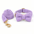 Purple teddy fleece collar and leash set with matching bow tie attached to the front of the collar