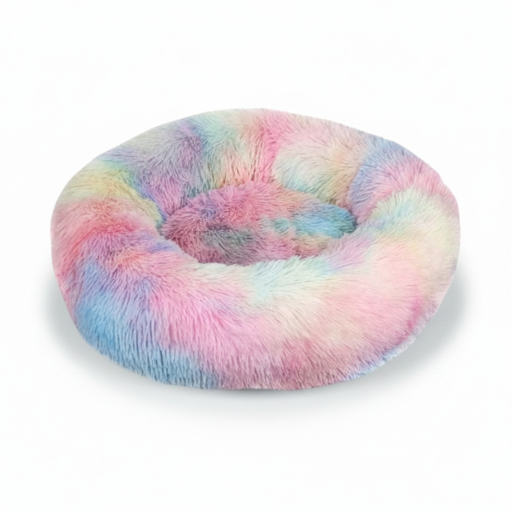 Round pastel rainbow tie-dye shaggy faux fur donut calming pet bed three-quarter view on white background