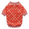Red and white sweater laid flat in the same back-facing position as the blue reference