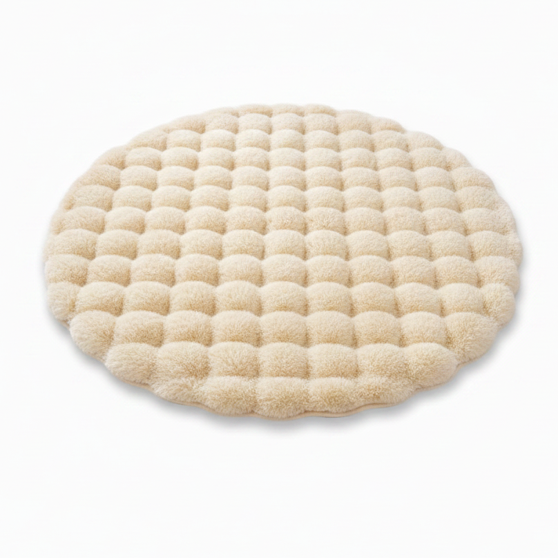 Round cream waffle-textured plush pet mat three-quarter view on white background