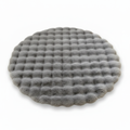 Round grey waffle-textured plush pet mat three-quarter view on white background