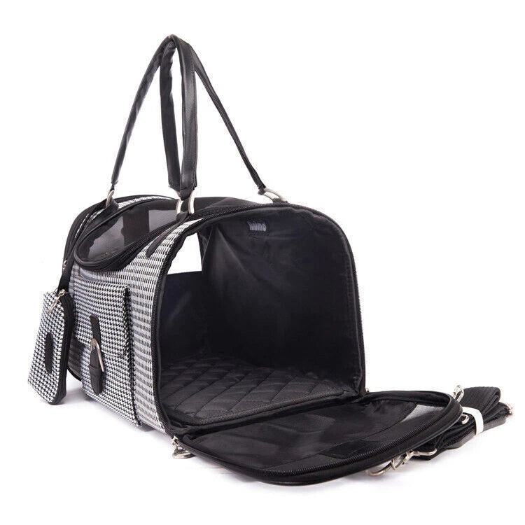 Pet carrier with houndstooth pattern on a white background