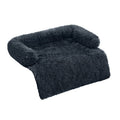 Dark charcoal grey long shaggy faux fur sofa cover protector with raised bolster back and sides and a flat front drape panel, shown at a 3/4 angle on a white background