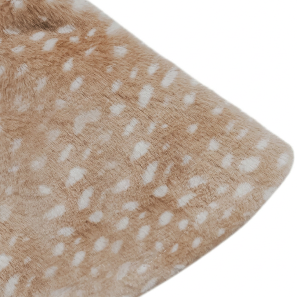 Spotted plush fabric detail on white