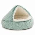 Teal long-pile plush round hooded cave pet bed with cream interior lining on white background